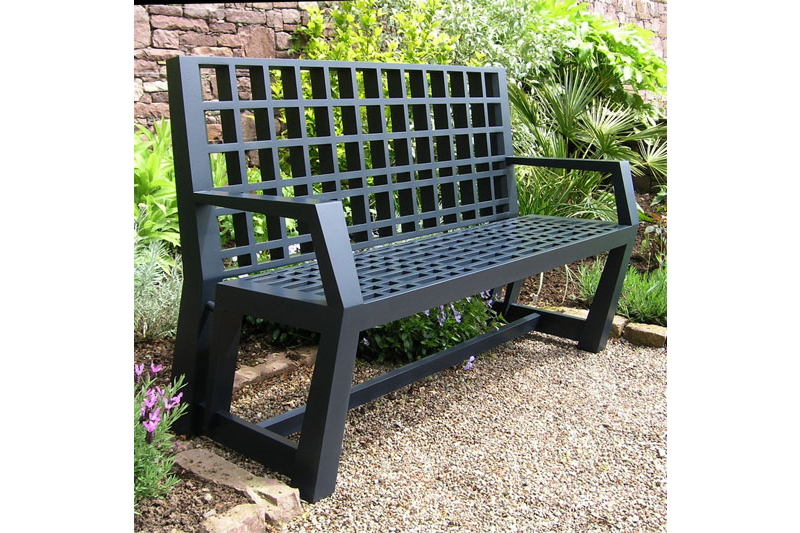 Outdoor bench made in solid Iroko and painted with exterior quality polyurethane paint.